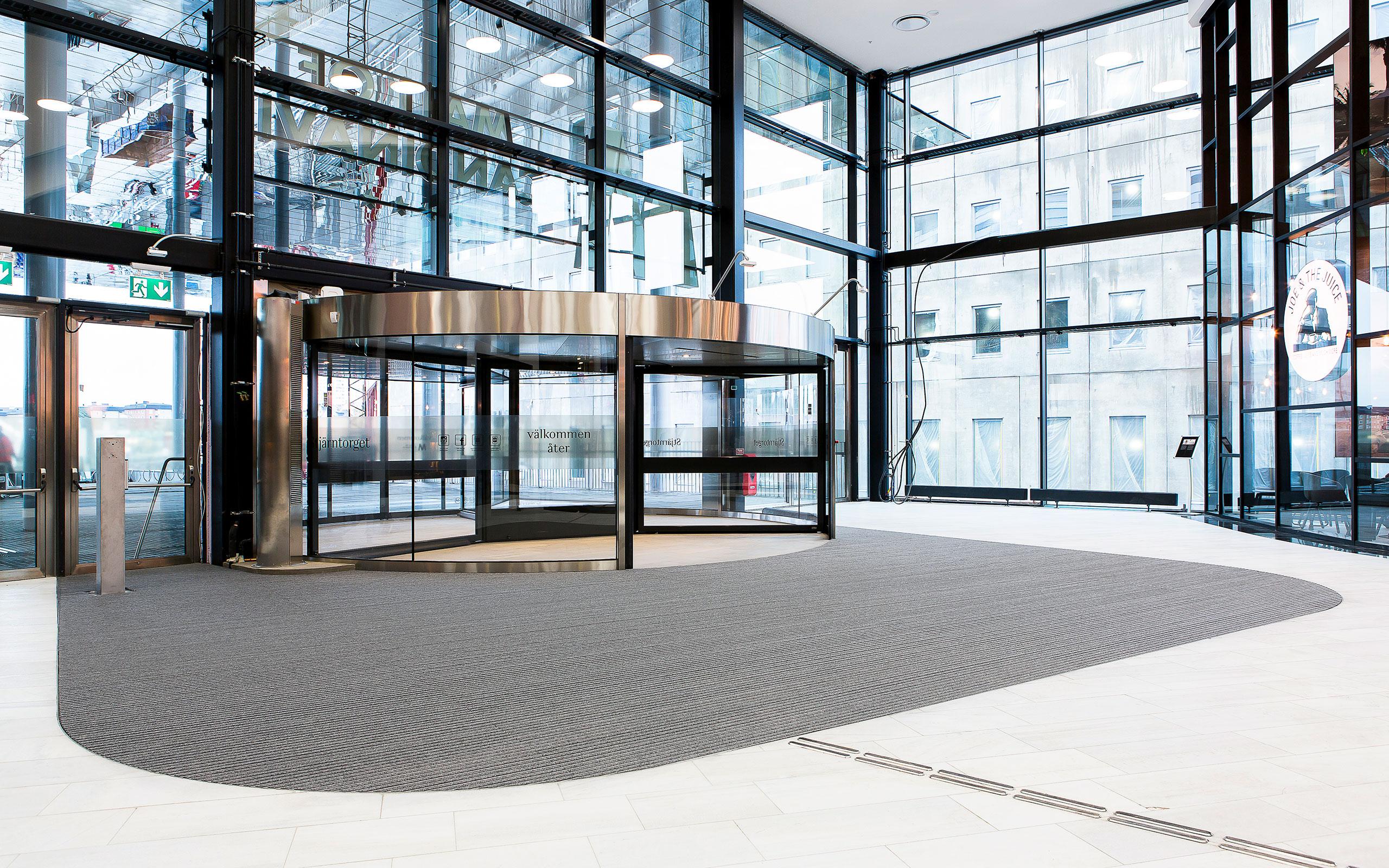 GEGGUS, expert en vente et pose de tapis d'entrée à passage intensif