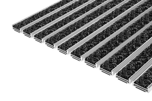 Top Clean ROBUST WAVE: Le tapis d'entrée Top Clean ROBUST WAVE avec l'insert WAVE 100% polyamide, préconisé pour des contraintes de passage extrêmes, assure un nettoyage efficace renforcé par les propriétés de brossage.