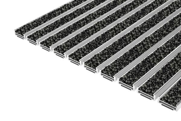 Top Clean ROBUST PULSE: Le tapis d'entrée Top Clean ROBUST PULSE  avec l'insert PULSE 100% polyamide est préconisé pour des contraintes élevées, à l'intérieur.